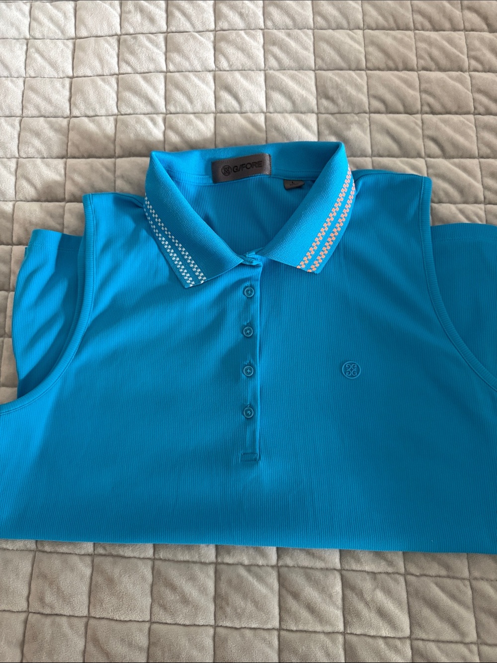 NWOT G/FORE Women’s Sleeveless Golf Polo in Turquoise with White & Orange Accent